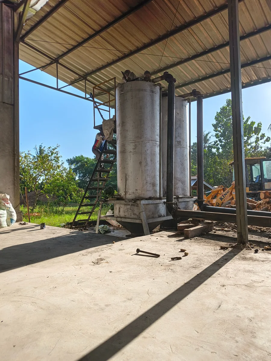 Biomass reactor under a covered processing area